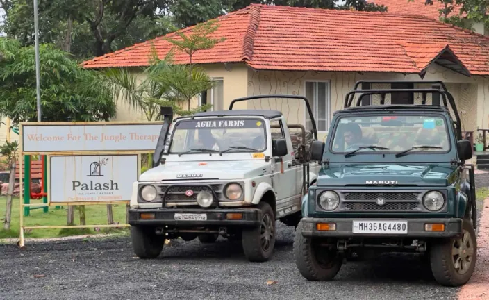 Safari jeeps parked at Palash Jungle Resort