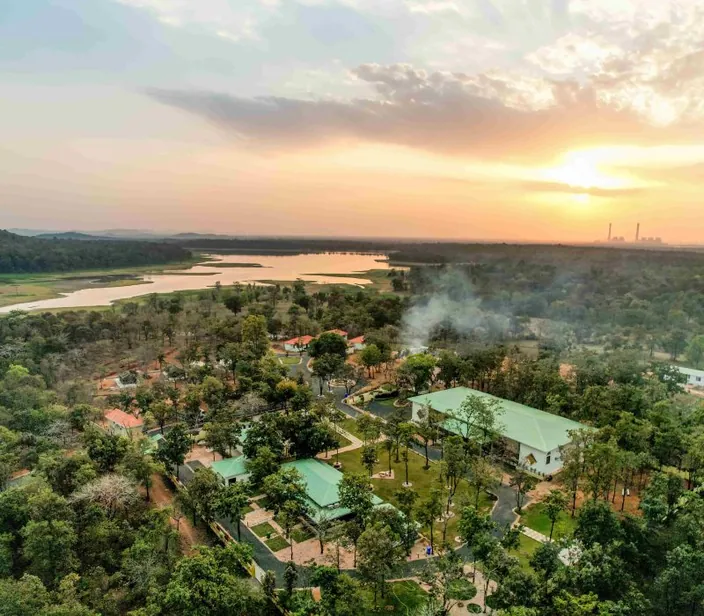 Aerial view of the resort and the lake at sunset